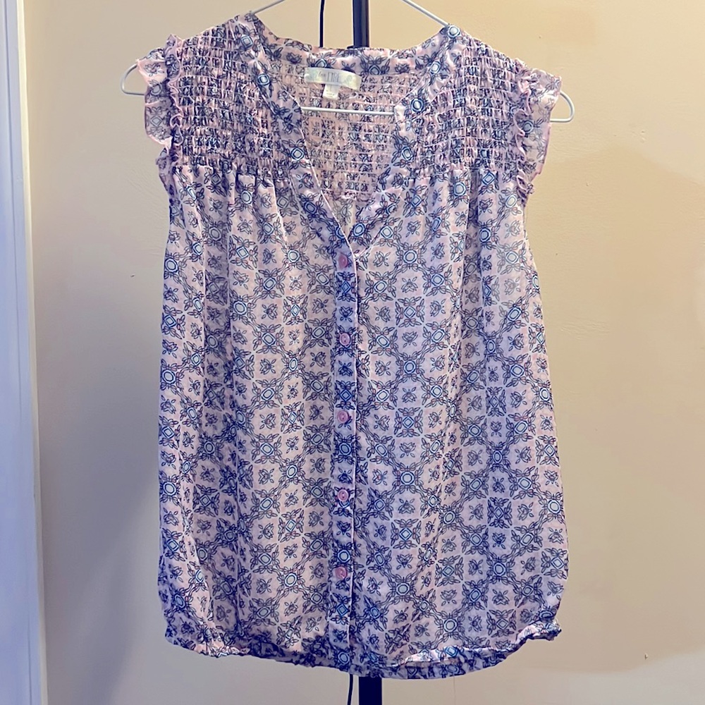 L girls blouse. Light pink with blue and white pattern.